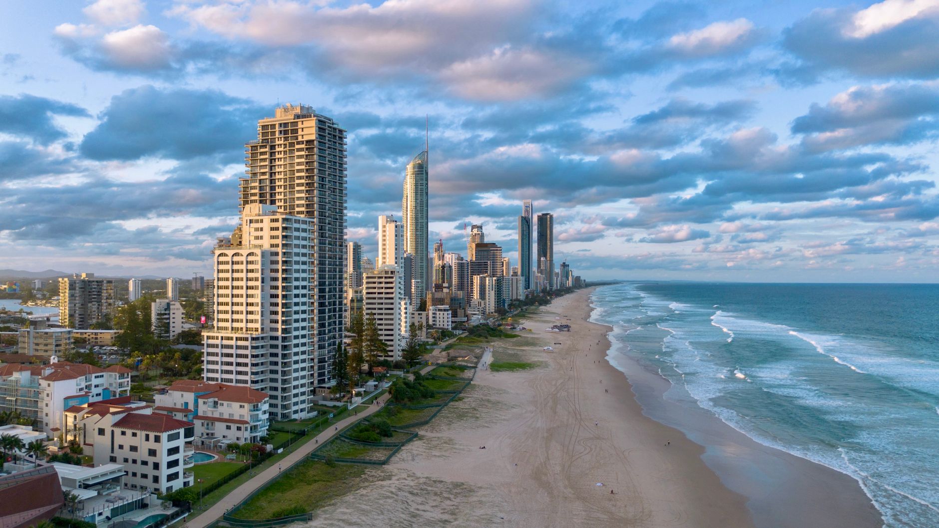 stunning skyline and beach of Gold Coast, Australia at sunset.